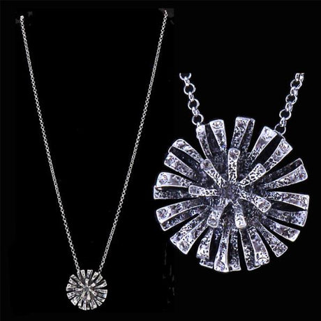 Antique silver flower necklace with crystal tips, 46 cm long, perfect for elevating any outfit with elegance.