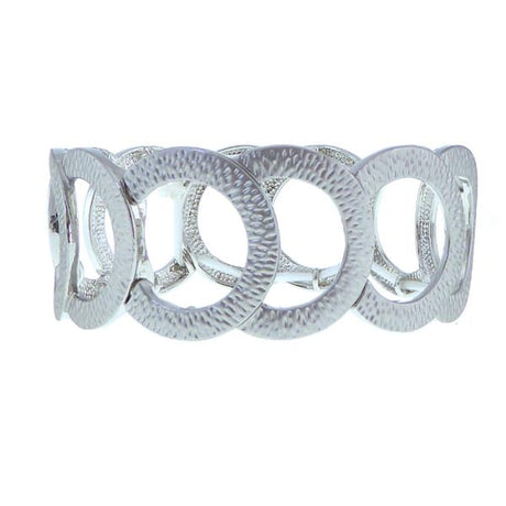 Elegant elasticated bracelet with textured circles in matt silver, perfect for both casual and formal occasions.