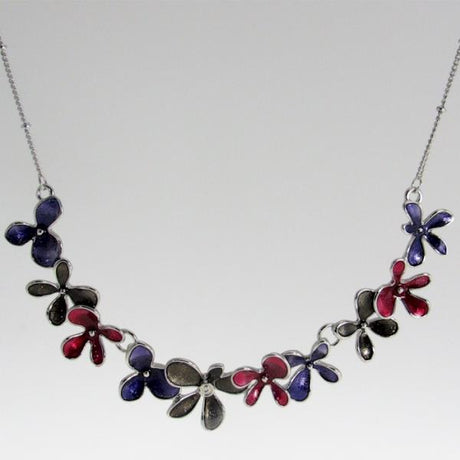 Elegant Jax necklace featuring a 12 cm wide three-piece flower pendant, adjustable length for versatile styling.