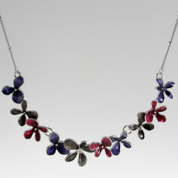 Elegant Jax necklace featuring a 12 cm wide three-piece flower pendant, adjustable length for versatile styling.