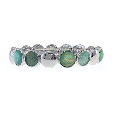 Silver bracelet featuring dark and light green circles, symbolizing harmony and balance, with a modern magnet fastening.