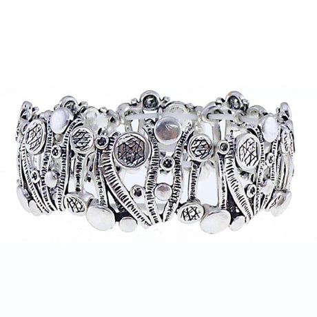 Antique silver bracelet featuring wavy bars and playful bobbles, perfect for stylish elegance on any occasion.