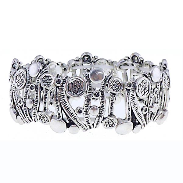 Antique silver bracelet featuring wavy bars and playful bobbles, perfect for stylish elegance on any occasion.