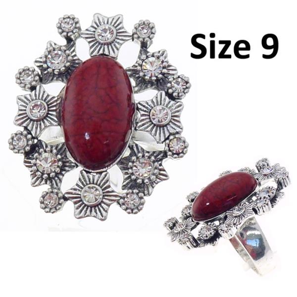 Elegant red ring with a large oval dark red resin center and sparkling diamante embellishments, size 9.