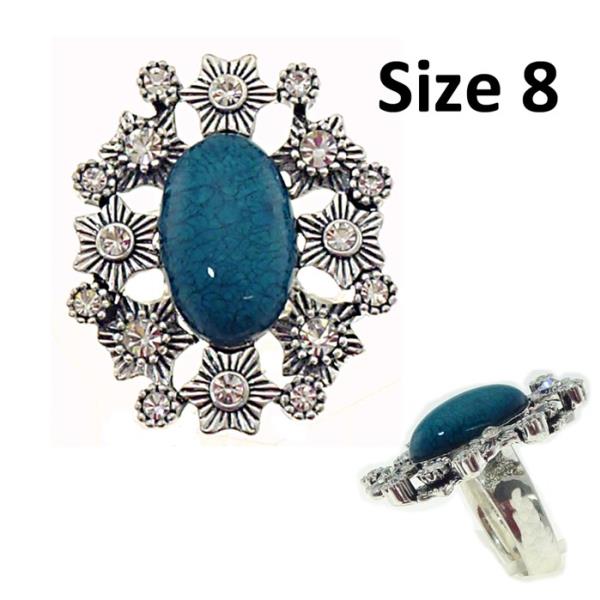 Teal ring with large oval resin center and sparkling diamante, size 8, perfect for elegant statement styling.