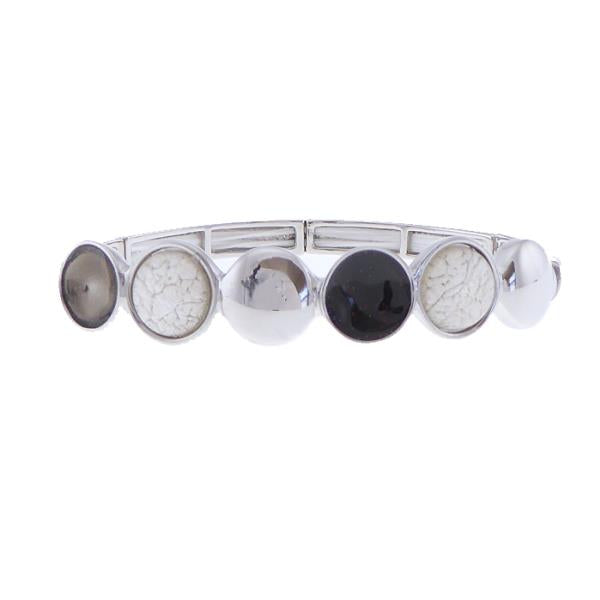 Elegant black and white resin circles bracelet with elasticated band for a comfortable fit and versatile style.