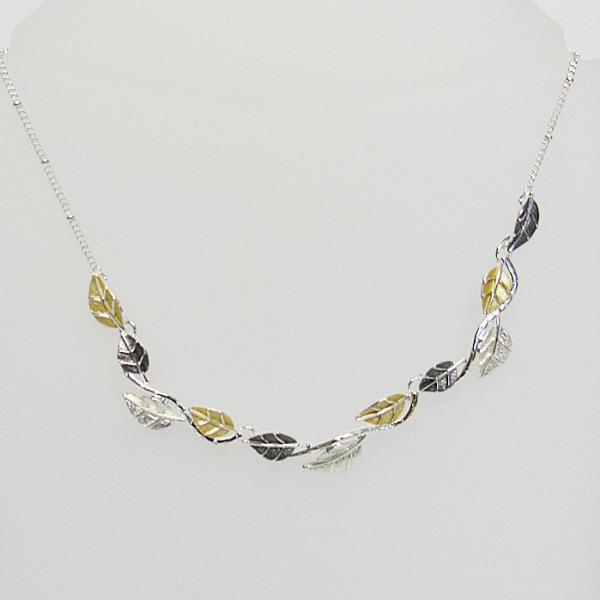 Elegant Leaves Necklace in gold, white, and silver with a 28 cm chain, symbolizing growth and nature's beauty.