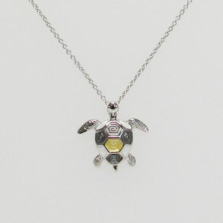 Golden, white, and silver sea turtle necklace on a 45 cm chain, symbolizing ocean beauty and nature's elegance.