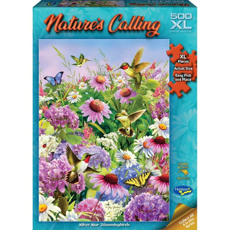 Colorful 500XL piece jigsaw puzzle featuring Silver Star Hummingbirds, designed by artist Greg Giordano, perfect for nature lovers.