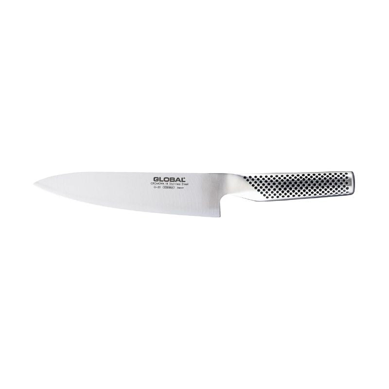 Global Classic G-55 Cook's Knife (18cm) with CROMOVA 18 stainless steel blade, razor-sharp edge, and dotted grip handle.