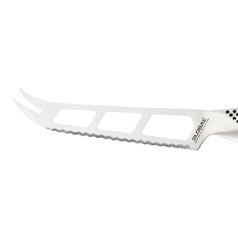 Global Classic Cheese Knife (14cm) features a serrated blade with holes, ideal for slicing various cheeses effortlessly.