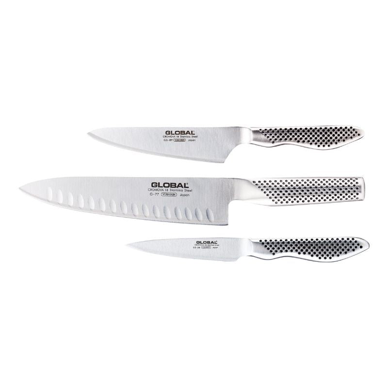 Global Classic 3 Piece Knife Set featuring a Fluted Cook's Knife, crafted from durable stainless steel for precision cutting.