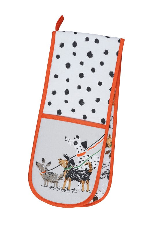 Ulster Weavers Dog Days oven glove featuring playful dog illustrations, eco-friendly materials, and ample heat protection.