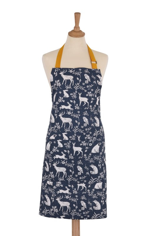 Ulster Weavers cotton apron with Forest Friends Navy design featuring woodland animals, perfect for eco-conscious cooking.