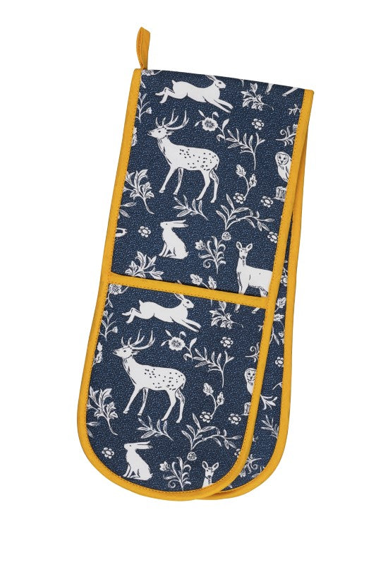 Ulster Weavers double oven glove featuring a woodland scene with animals in navy, crafted from recycled cotton.