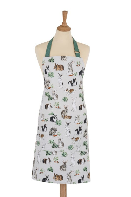 Cotton apron with playful rabbits on a parchment background, featuring adjustable straps for eco-friendly cooking fun.