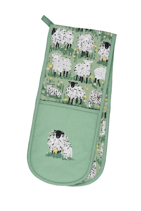 Ulster Weavers Double Oven Glove featuring charming hand-illustrated sheep and lambs on a warm green background.