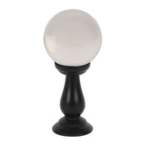 Clear 90mm crystal ball on a sleek black wooden stand, ideal for fortune telling and mystical decor.