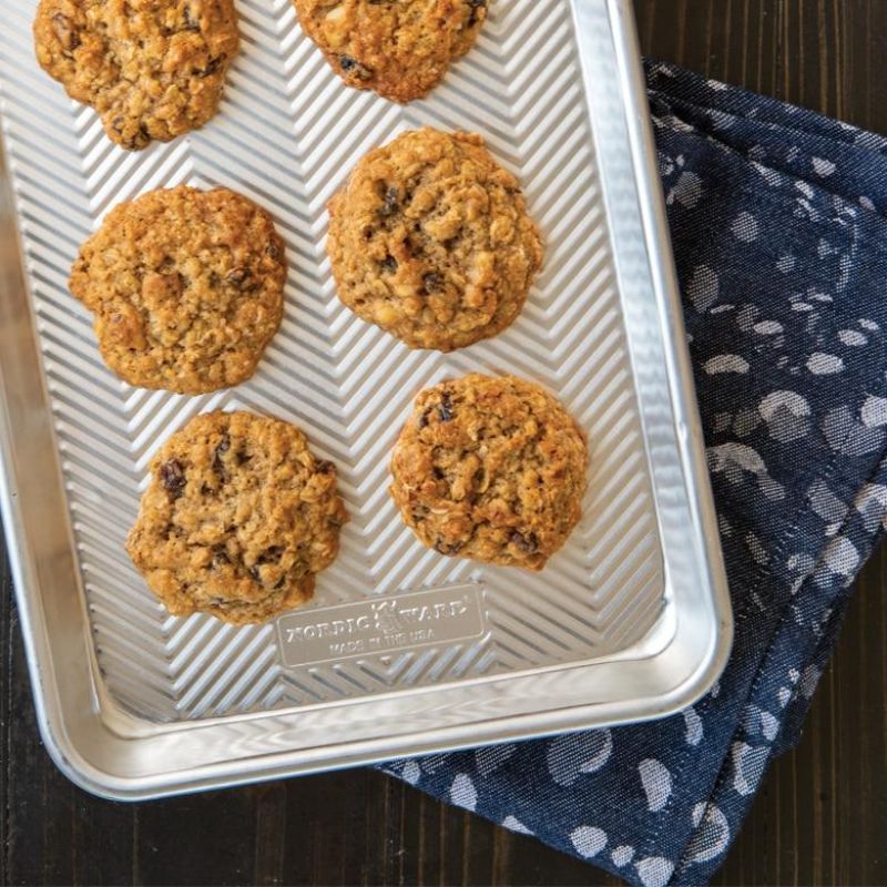 Nordic Ware Prism Quarter Sheet Pan in natural aluminum, features a prism grid design for even baking and durability.