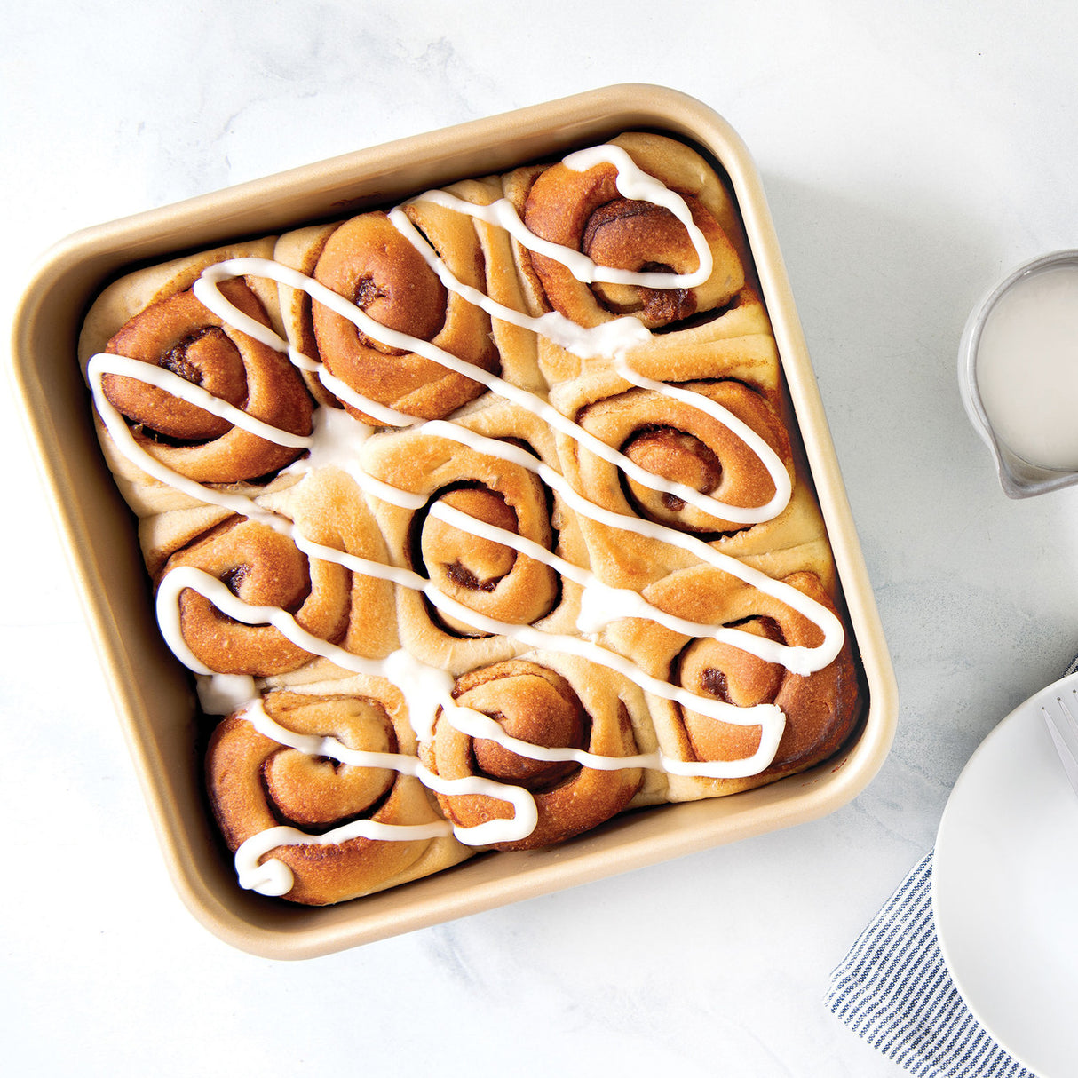 Nonstick 9-inch square cake pan for even baking, easy release, and effortless cleanup, perfect for all desserts.