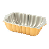 Nordic Ware Classic Fluted Loaf Pan, 25.5x15x8cm, ideal for baking elegant fluted breads and desserts with a nonstick finish.