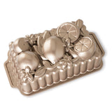 Nordic Ware Toffee Citrus Blossom Loaf Pan for beautifully shaped breads and cakes, featuring a 6-cup capacity and elegant design.