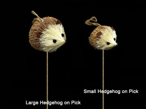 Small hedgehog ornament on a pick, perfect for garden decor and whimsical indoor accents.