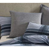 Logan & Mason Georgio Navy Quilt in Super King size with classic check pattern, 60% cotton blend for luxury and comfort.