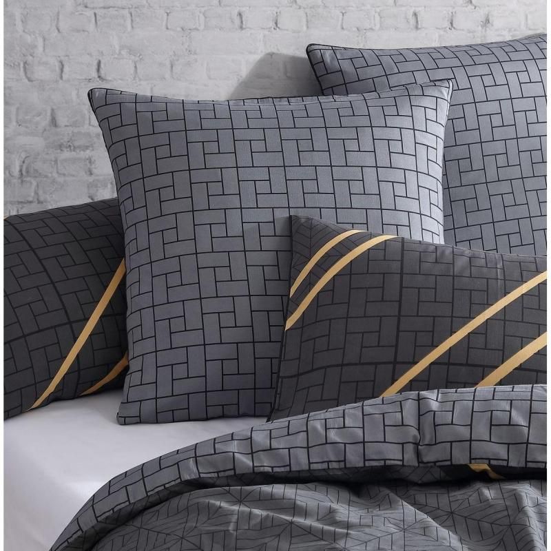 Logan & Mason Jamala Black European Pillowcase featuring bold geometric designs with mock gold accents for a sophisticated look.