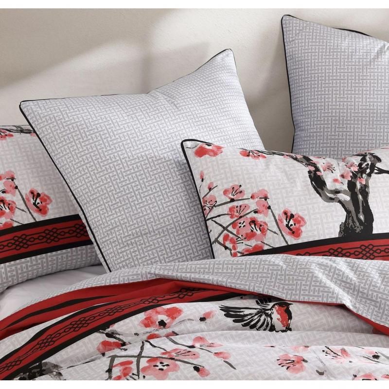 Kyushu Red quilt for super king bed featuring cherry blossoms, swallows, and elegant black piping, crafted from cotton-polyester blend.