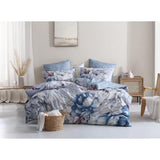 Logan & Mason Liv Silver European Pillowcase features oversized watercolor blooms in silver, mauve, and icy blues with elegant foliage on the reverse.