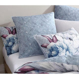 Logan & Mason Liv Silver European Pillowcase featuring oversized watercolor blooms in silver, mauve, and icy blues.