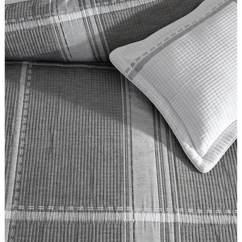 Elegant Charcoal jacquard duvet set for Super King bed, featuring subtle check pattern, soft matelasse cover, and refined design.