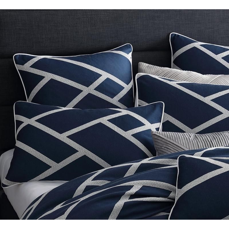 Navy jacquard quilt set for king beds, featuring elegant patterns and soft cotton blend for luxurious comfort.