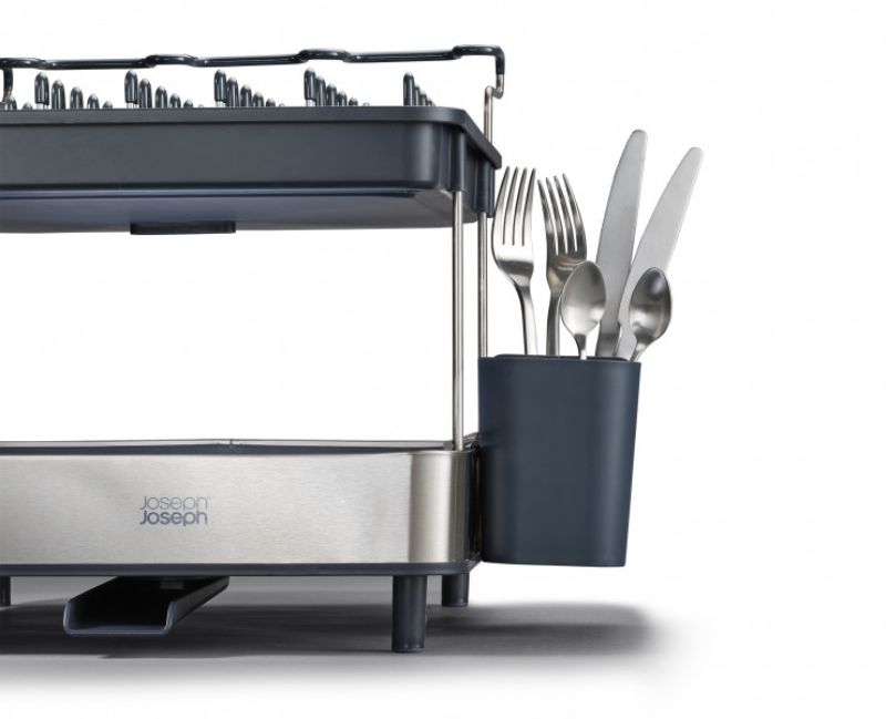 Stylish two-tier dish rack with wine glass holder, adjustable cutlery holder, and efficient draining design for compact kitchens.