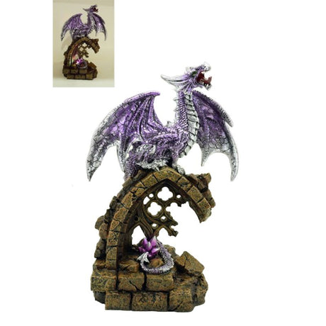 Intricate purple dragon lamp on castle ruins, 24.7 cm tall, merging fantasy and functionality with enchanting LED light.