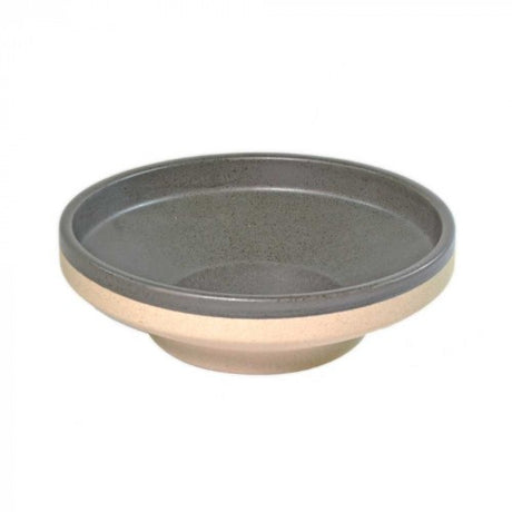 Round footed bowl with a speckled finish, perfect for serving appetizers, salads, or desserts; stylish and versatile dining piece.