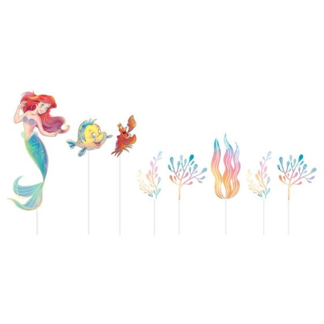 Colorful Little Mermaid cake decorating kit with vibrant toppers like mermaid tails and starfish for themed celebrations.