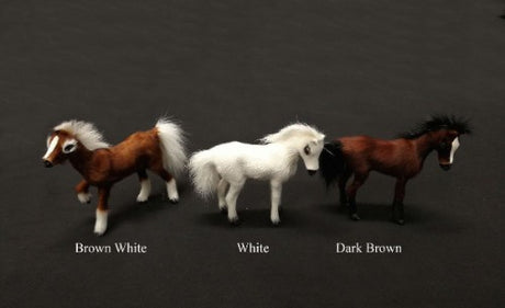 Dark brown horse ornament, 11cm long, 9cm high; adds rustic charm to home decor for horse lovers.
