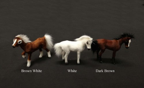 Dark brown horse ornament, 11cm long, 9cm high; adds rustic charm to home decor for horse lovers.