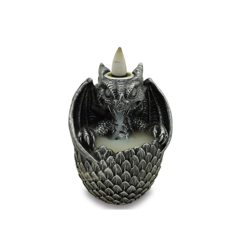 Intricate black backflow incense burner shaped like a dragon with glowing crystals creating a mesmerizing smoke waterfall effect.