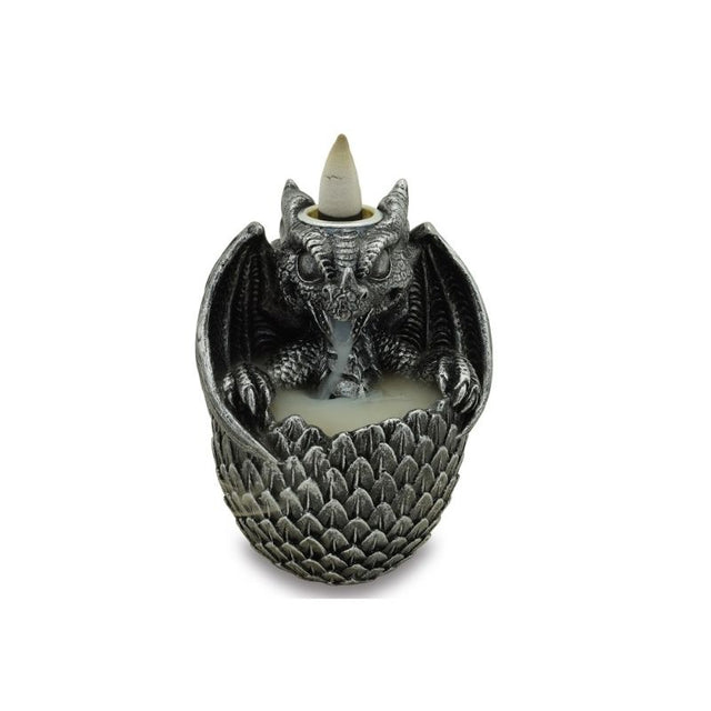 Intricate black backflow incense burner shaped like a dragon with glowing crystals creating a mesmerizing smoke waterfall effect.