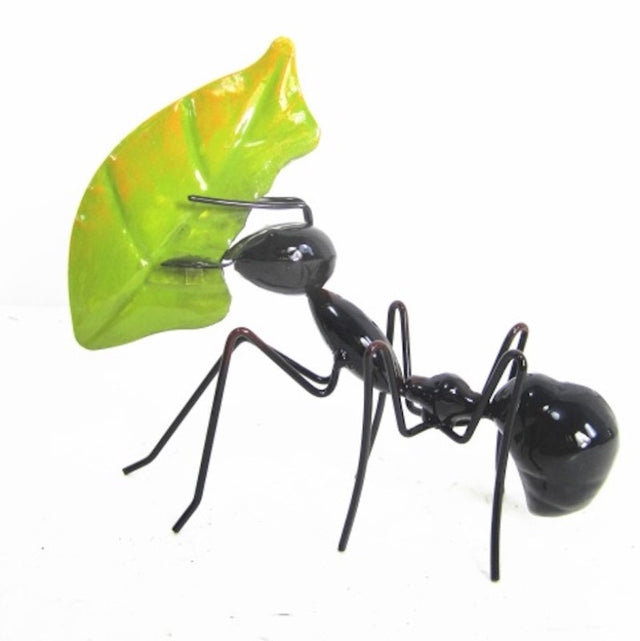 Metal sculpture of an ant holding a vibrant leaf, perfect for adding whimsy to any home decor.