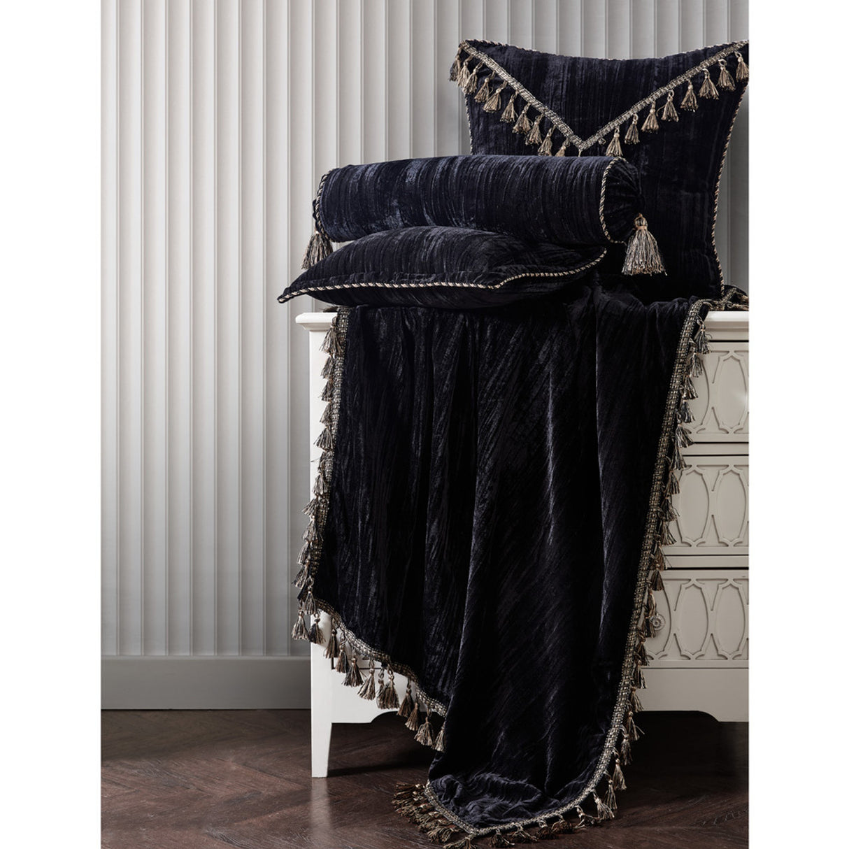 Square filled cushion in crushed velvet with decorative braid and tassel trims for elegant home decor, 43cm x 43cm.