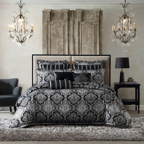 Elegant queen duvet cover set in Chamonix Silver featuring damask motifs, reversible pillowcases, and luxurious finishing touches.