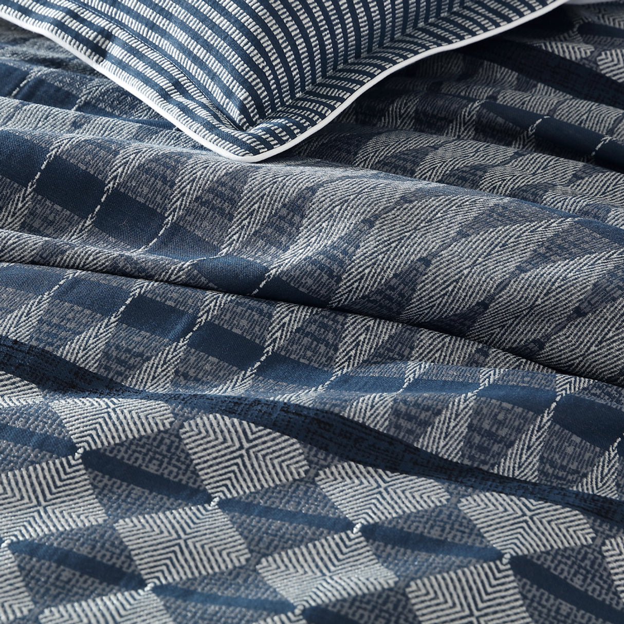 Queen duvet cover set in slate blue and silver grey with striped and geometric patterns, featuring concealed button closures.