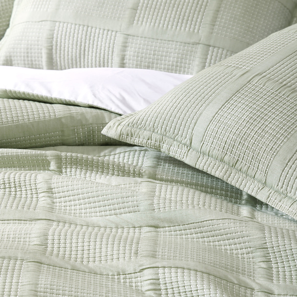 Luxurious sage green King Duvet Cover Set featuring textured design, concealed button closures, and soft cotton-polyester blend.