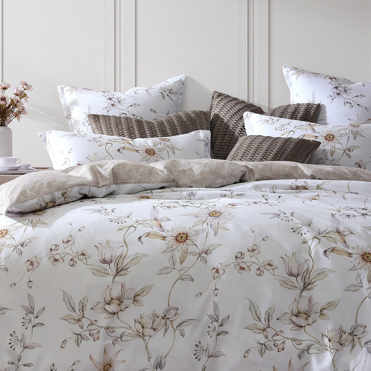 Queen duvet cover set featuring a delicate floral design in soft pink, lilac, and blue, with a linen fern pattern on the reverse.