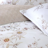 Queen Duvet Cover Set featuring a delicate floral design in pastel pink, lilac, and blue with a linen fern reverse pattern.