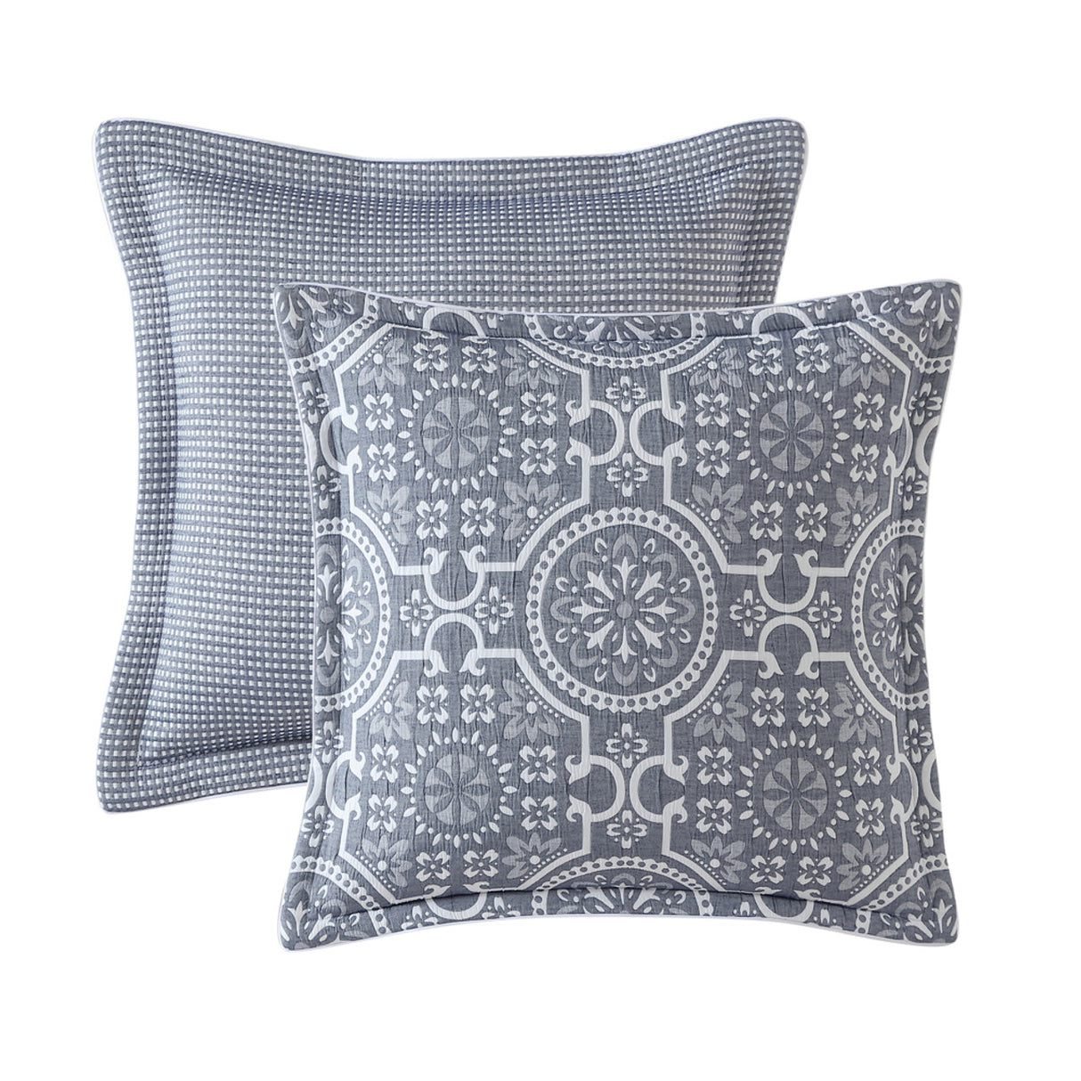 Mayfair Navy Square Filled Cushion showcasing folk art motifs in blue, featuring a quilted surface for soft comfort.